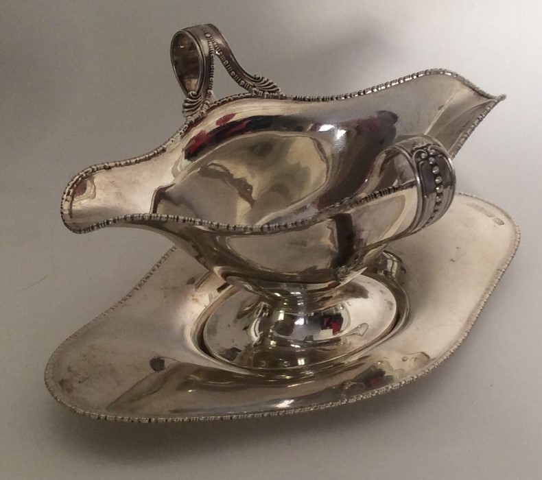 A good quality double lipped silver sauce boat on - Image 2 of 2