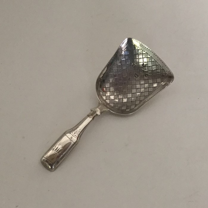 A Victorian silver bright cut caddy spoon with wri