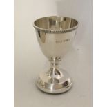 An Edwardian silver egg cup. Birmingham 1933. Appr