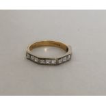 A good 18 carat princess cut diamond half eternity