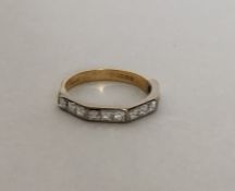 A good 18 carat princess cut diamond half eternity