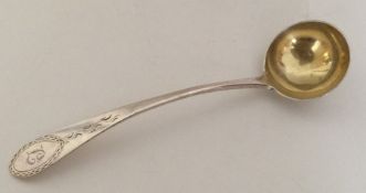 An American bright cut silver sauce ladle. By I Cl