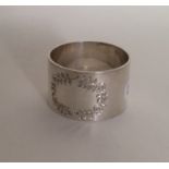 A heavy quality silver napkin ring engraved with c