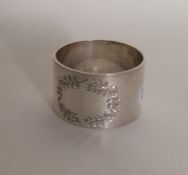 A heavy quality silver napkin ring engraved with c