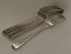 A heavy set of eight Edwardian silver OE pattern t