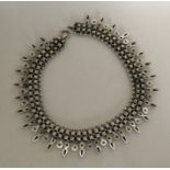 A Victorian silver collar with pierced and engrave