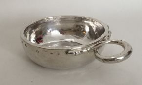 A heavy 18th Century French silver wine taster wit