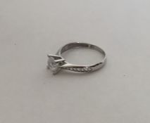 A 9 carat single stone ring in claw mount. Approx.