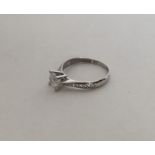 A 9 carat single stone ring in claw mount. Approx.