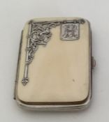 An attractive silver and ivory purse with inlaid d