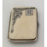 An attractive silver and ivory purse with inlaid d