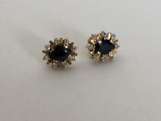 A pair of good quality 18 carat gold sapphire and