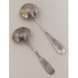 Two Russian silver sifter ladles. Approx. 65 grams