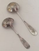 Two Russian silver sifter ladles. Approx. 65 grams