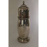 An Edwardian silver sugar caster of Art Deco for.