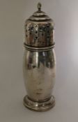 An Edwardian silver sugar caster of Art Deco for.