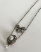 An attractive Victorian boxed pearl and diamond pe