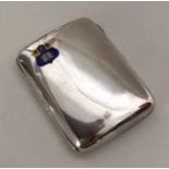 A silver and enamelled cigarette case with gilt in