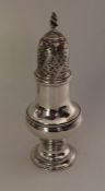 A Georgian silver baluster shaped pepper. London 1