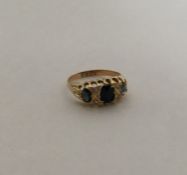 An Antique sapphire and diamond seven stone ring i