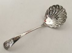 A good quality silver sifter spoon with fluted bow