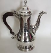 A good George II silver coffee pot, the side attra
