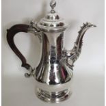 A good George II silver coffee pot, the side attra