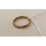 A plain 22 carat gold wedding band. Approx. 2.7 gr