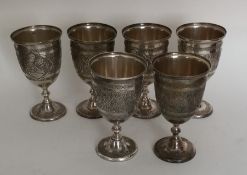 An attractive set of six silver Persian goblets en