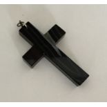 A large banded agate cross with silver loop top. A