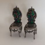 A pair of silver and plique-à-jour doll's house ch
