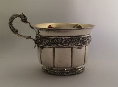 A Georgian silver christening sup with gilt interi