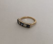 A large sapphire and diamond five stone ring in Ar