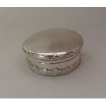 TIFFANY & CO: A circular Sterling silver pill box