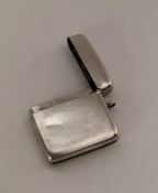 A plain silver hinged top vesta case. London 1908.