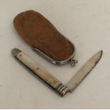 A Georgian silver and MOP fruit knife contained wi