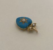 An enamel, pearl and rose diamond pendant with loc