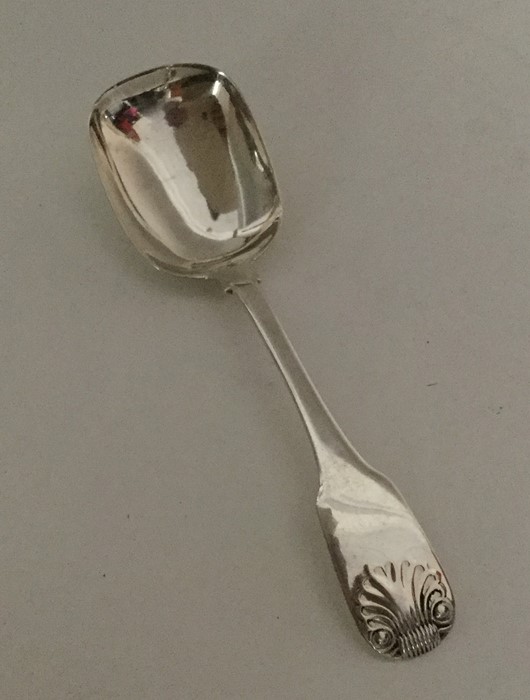 A fiddle pattern silver jam spoon. London. By WK&S
