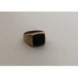 A heavy large gent's 9 carat signet ring. Approx.