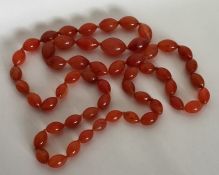 A large oval cornelian graduated bead necklace. Ap