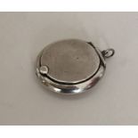 An Edwardian silver miniature compact with hinged