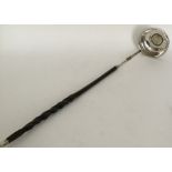 A Georgian silver toddy ladle with central coin to