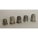 A bag containing five silver thimbles. Various dat