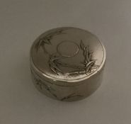 A Chinese silver hinged top box. Marked to base. A