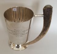 An unusual silver plated tankard with horn handle