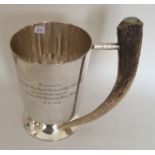 An unusual silver plated tankard with horn handle