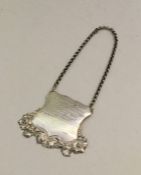 An unusual silver shield on suspension chain. Appr