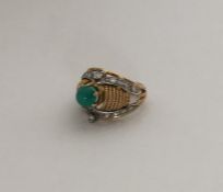 An 18 carat two colour gold diamond and turquoise