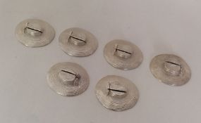 A set of six silver menu holders in the form of bo