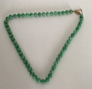 A good carved jade string of beads with high carat